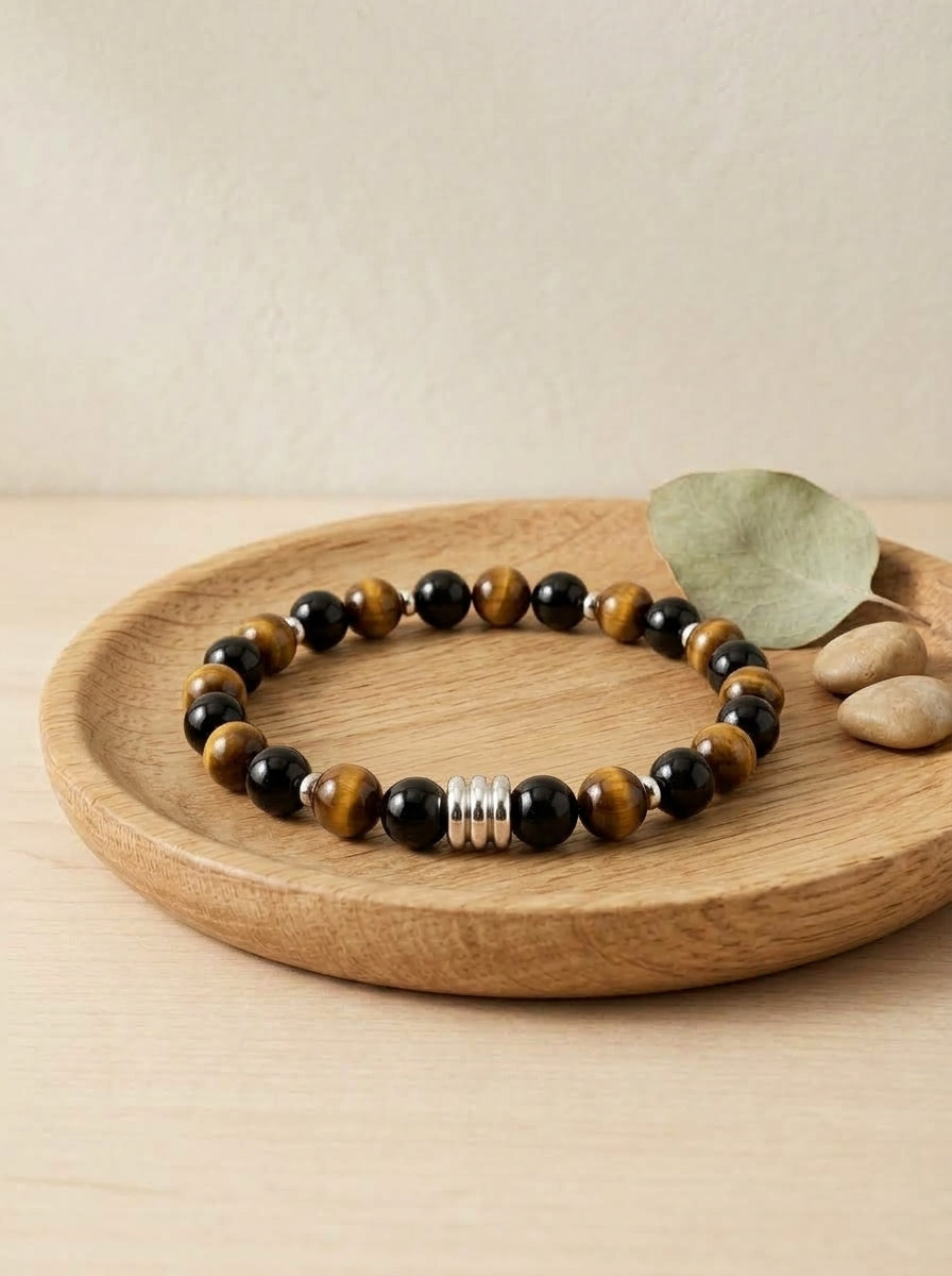 Pulsera Célyos plateada con ojo de tigre y ónix – elegancia y poder en un accesorio exclusivo 1