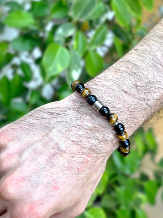 Pulsera Célyos plateada con ojo de tigre y ónix – elegancia y poder en un accesorio exclusivo