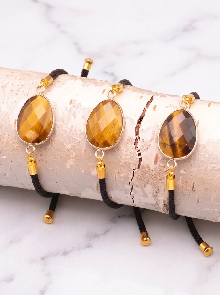 Pulsera de ojo de tigre facetada en cordón negro ajustable, joya de protección y confianza personal. 1