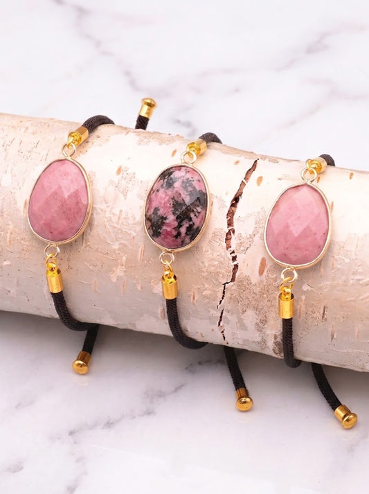 Pulsera de rodonita facetada en cordón negro ajustable, joya de amor propio y sanación emocional. 1