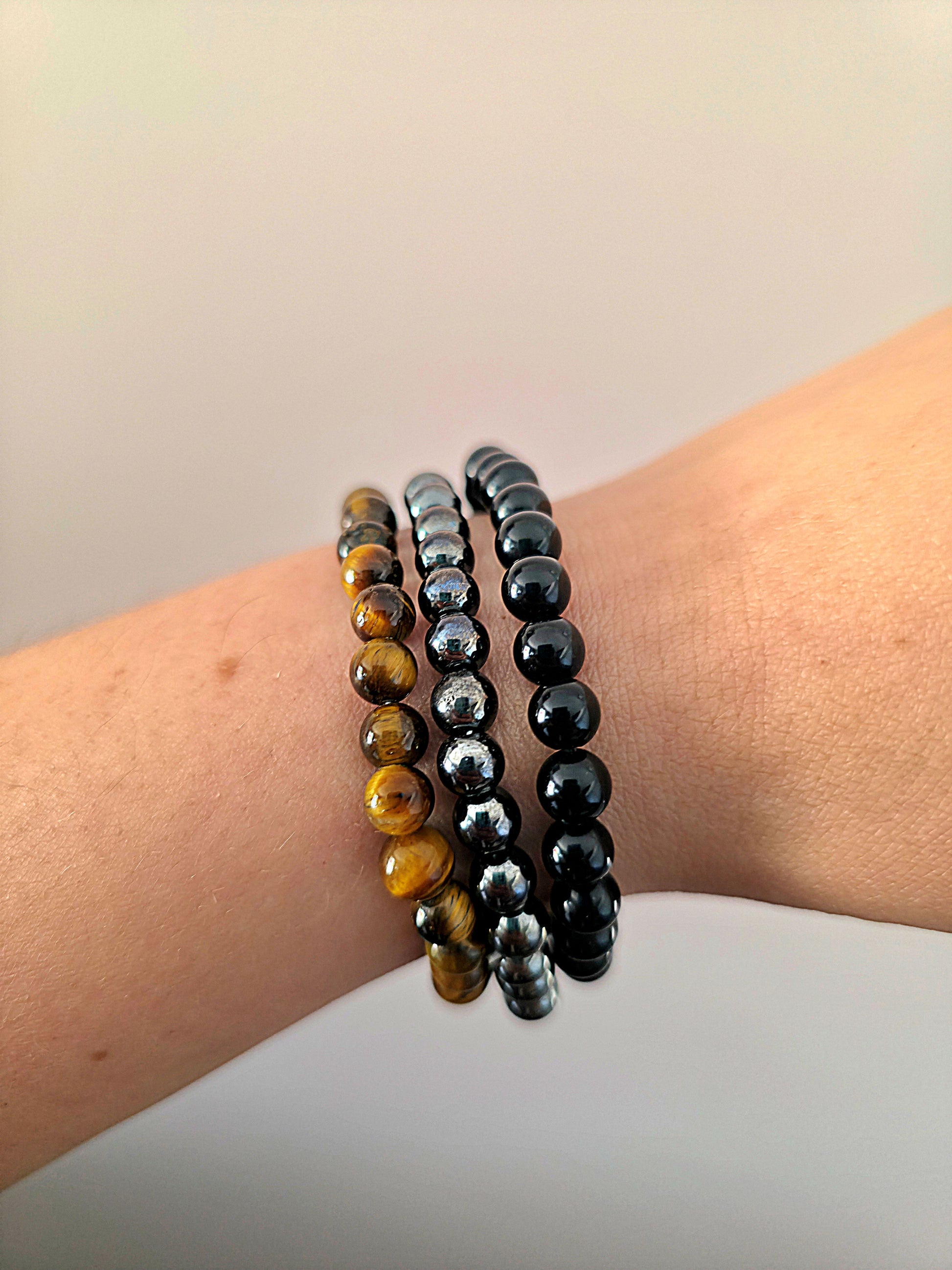 trio pulseras proteccion seguridad turmalina negra hematites ojo de tigre